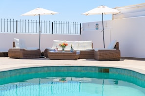 Beautiful poolside seating area 