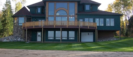 Back of the cottage, facing north.  Man-made beach.