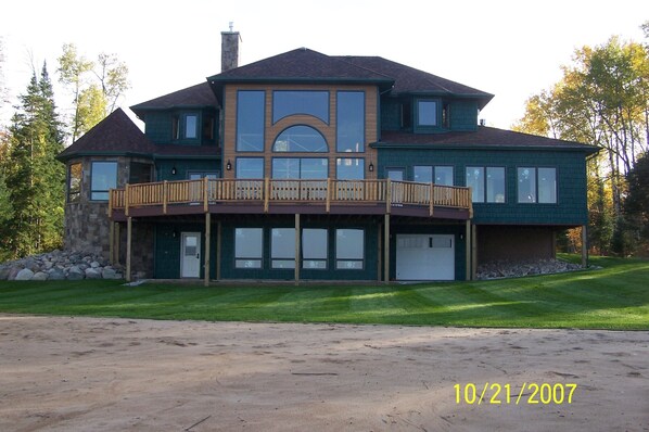 Back of the cottage, facing north.  Man-made beach.