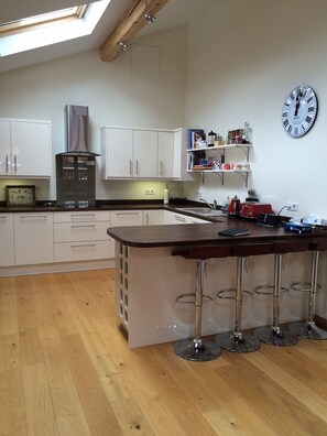 Kitchen area with breakfast bar