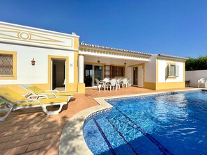 Villa Ana's partly covered pool terrace is welcoming, overlooking the sunny, south facing, long 10 x 4 metres pool with wide, walk-in Roman steps.