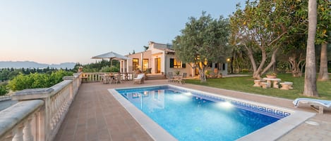 Elevated pool area with panoramic views.