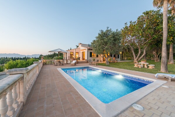 Elevated pool area with panoramic views.