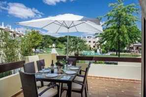 Patio Dining over looking the pool and gardens