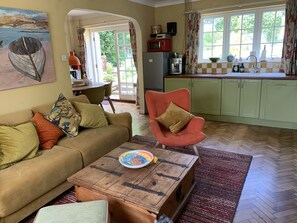 Kitchen / diner / sitting room (open plan) leading out into garden