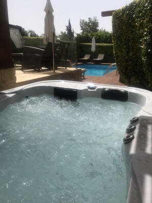 hot tub with a pool view!