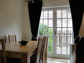 Dining area with patio doors to private courtyard