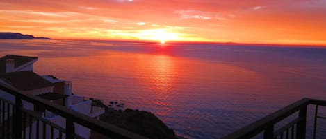 Sun rise over the ocean - view from the terrace