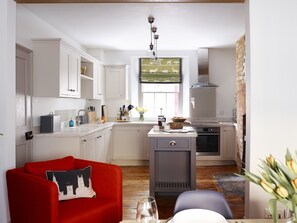 Kitchen with feature boiling hot water tap, compactor and all usual appliances