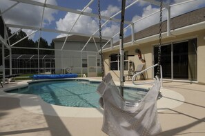 Sunny Pool Deck with Pool Lift