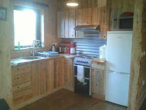 Rustic, well equipped kitchen