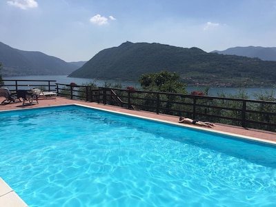 Two-room apartment in Residence with swimming pool and panoramic lake view in Sale Marasino