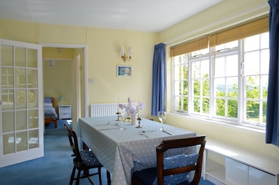 Charming cottage, set in a large garden within a Devon village with lovely views