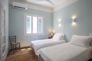 Bedroom two with king size double. Here set up as  twins. 
