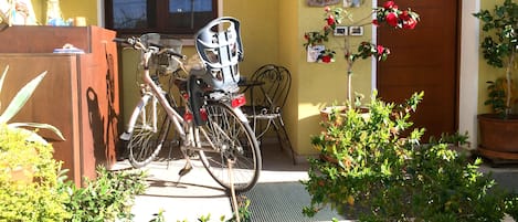 Entrance to the house with one of the bikes provided by us