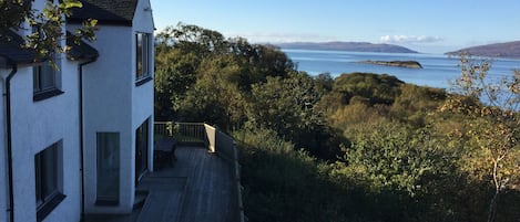 The house with Corryvreckan whirlpools in the background