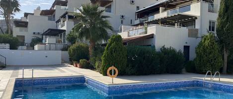 Communal pool - the apartment is far back left (pool surrounds being upgraded)