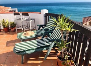 Terrace overlooking sea and the beach