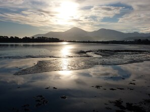 View from the patio towards the Mournes, as the evening sun goes down