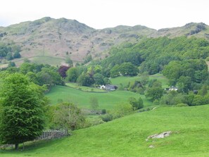 Ellers Cottage under Loughrigg Fell (the building on the left in the photo). 