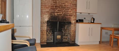 Kitchen area with woodburner