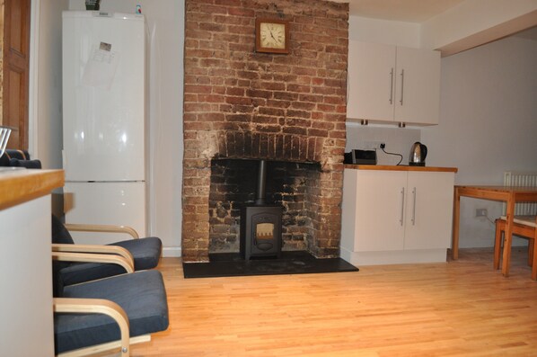 Kitchen area with woodburner