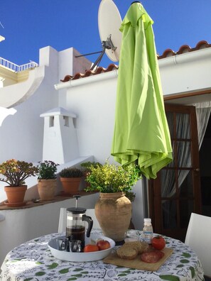 Lovely sunny terrace off master bedroom, perfect place to enjoy breakfast