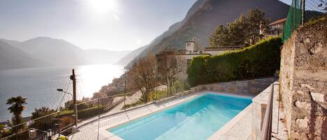 Panoramic lake views from the pool at "Argegno Pool Apartment"