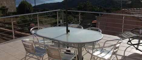 Terrasse avec vue sur le golfe