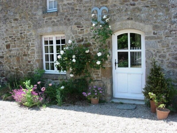 Front entrance to the cottage.  Car parking to the right infront of garage