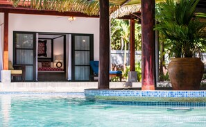 Poolside view into one of the custom casitas