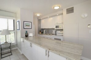 Fully equipped kitchen with granite counter tops