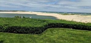 Lawn view, Nauset Harbor in foreground, Nauset Beach, then Atlantic Ocean