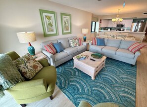 Two full couches and table for 8 plus 4 bar stools.