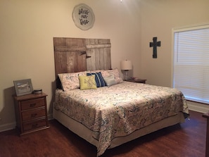 King size bed in master bedroom