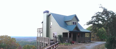 View of house coming up drive.