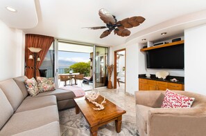Enjoy ocean views from your LR thru floor-to-ceiling sliding glass doors