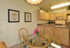 Dining area and view into kitchen