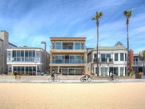 View of the property from the beach. This listing pertains to the 2nd level unit. The first level unit can be booked simultaneously upon availability.