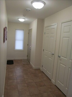 The entry and closet are large enough to accommodate several people 