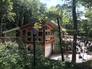 Eclectic exterior design and window wall ...... view from driveway!