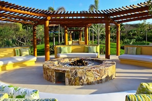 Enjoy a cocktail around the fire pit at night. 