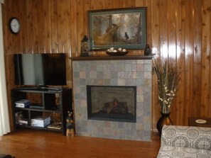 Enjoy the fireplace and the new Smart TV w/NETFLIX or the DVD Blueray player..