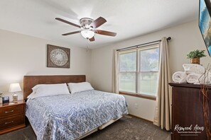 King bed in 2nd bedroom with 55" Smart TV