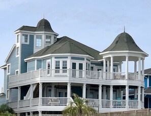 View of our home from the beach.  Look at all the deck space with ocean views!