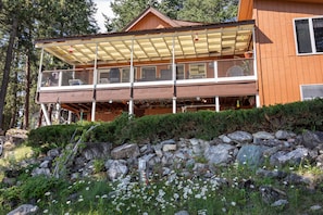 Looking up at the cabin from the yard below