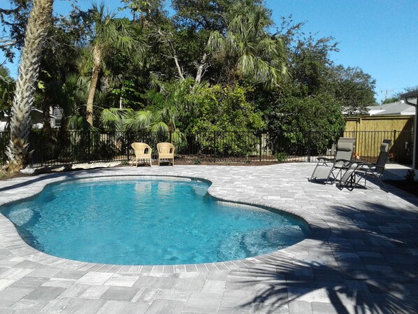 our new back yard pool - fully fenced in with new pavers and landscaping.