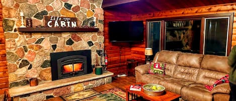 Wood fireplace with swivel mount HDTV