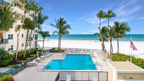 Stunning beachfront heated pool and jacuzzi adjacent to the condo.