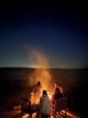Oceanside fire pit under the stars!